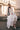 THE PLUNGING-NECK SILK CHIFFON GOWN IN WHITE